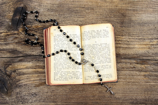 the Bible and a rosary