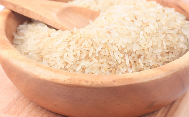 White rice on wooden bowl