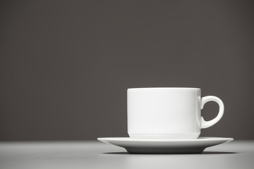 Coffee cup on a gray background.