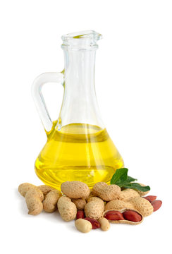 Peanut oil in a glass jug.