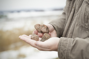 Man with rocks in the hands