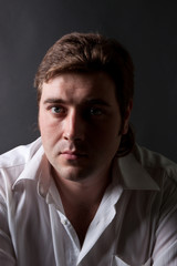 Fototapeta premium man posing in white shirt