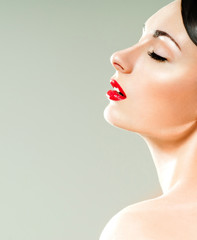 beautiful woman with professional makeup, red lips