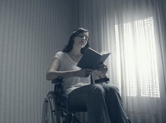 Young woman reading a book