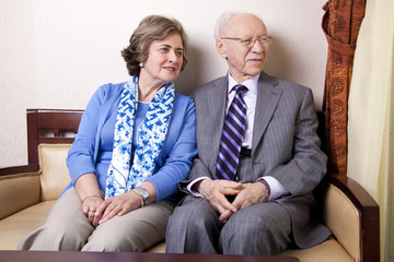 Elderly Couple Looking Away