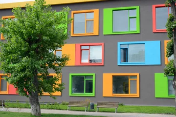 Deurstickers colorful facade of the school of arts © Photobank