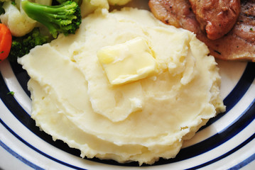 A Side Dish of Mashed Potatoes with Butter