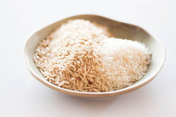 A mound of natural brown and white rice seeds