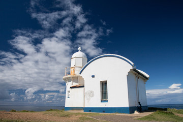 Light house with blue sky.