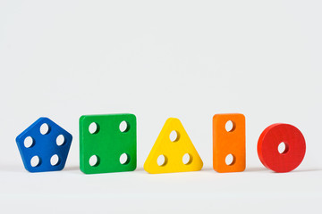 Colorful wooden blocks on a white background.