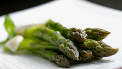 Fresh asparagus with Brie cheese and olive oil