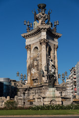 Fototapeta na wymiar Plaza de Espana fountain with National Palace in background, Bar
