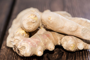Ginger on wooden background