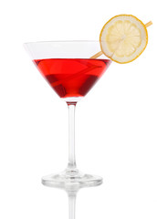 Red cocktail in martini glass isolated on white