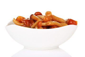 Mushrooms in bowl, isolated on white