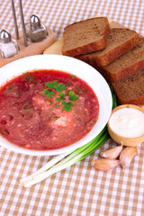 Delicious borsch on table close-up