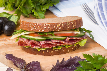 Sandwich with sausage and vegetables