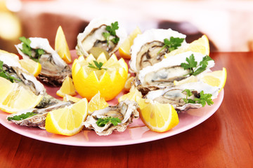 Oysters on table in cafe