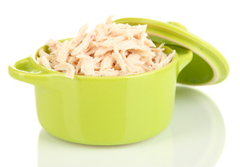 Shredded boiled chicken in green pan isolated on white
