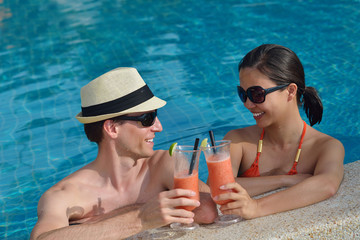 happy young couple have fun on beach