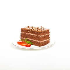 Slice of tasty chocolate cake with strawberry
