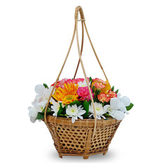 Fototapeta na wymiar Flower in sedge basket isolated on white.