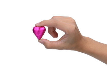 Fototapeta premium woman finger pick heart chocolate