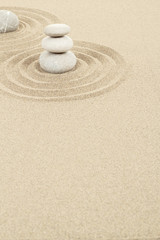 Balance zen stones in sand