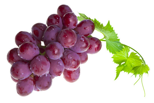 Red grape with foliage isolated on white