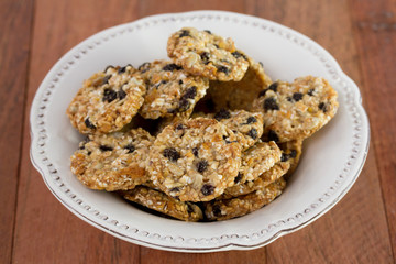 cookies with dry grapes in the plate