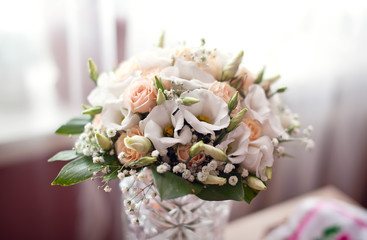 White wedding flowers at the vase