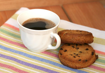 cup of coffee with cookies