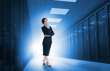 Fototapeta na wymiar Businesswoman standing in data center