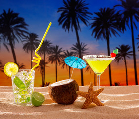 beach cocktail sunset on palm tree sand mojito margarita