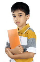 Depressed Indian School Boy with Textbook