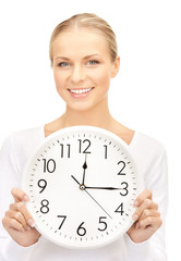 businesswoman with wall clock