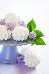 Fototapeta na wymiar Marshmallow (zephyr) on cake stand, selective focus