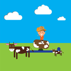 Obraz na płótnie Canvas cowboy in the field with cows trains on the bull