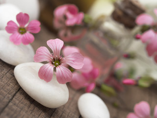 spa settings with pink flowers