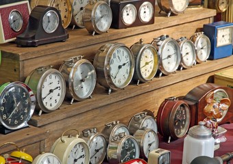 antique vintage alarm clocks and watches for sale at flea market