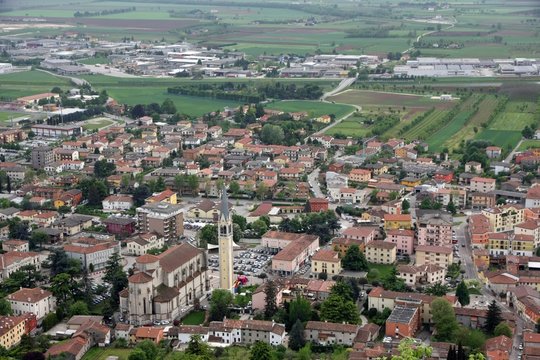 Church with the Bell Tower of montecchio maggiore and the urban