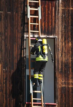 Brave Firefighters With Oxygen Tank Fire During An Exercise Held