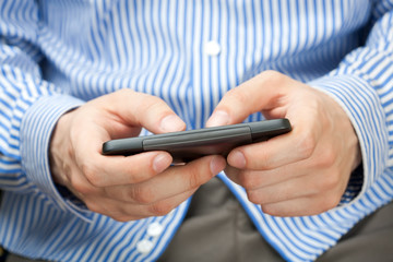 Young adult using smart phone