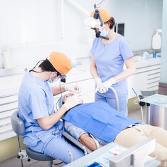 Dental health doctor assistant and patient