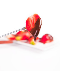 strawberry dipped in chocolate fondue