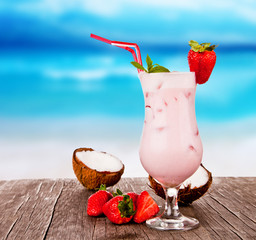 Summer drink with blur beach on background