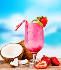 Summer drink with blur beach on background