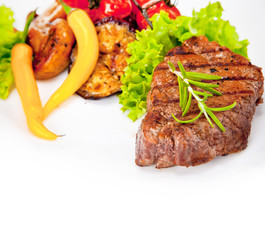 Grilled steak and potato isolated on white background