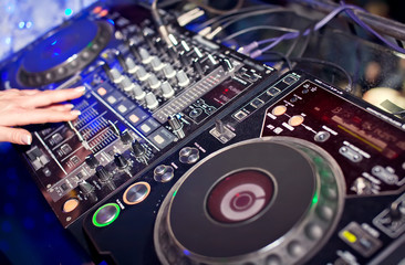 Dj mixing in night club