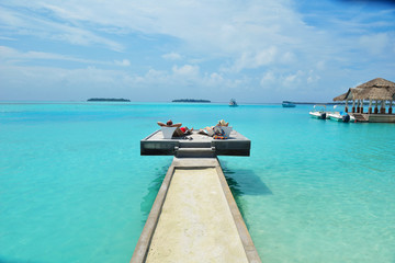 happy young couple have fun on beach